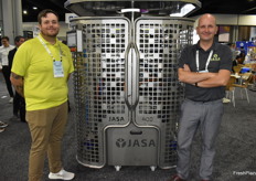 Cameron Way and Joost Somford with JASA Packaging, standing next to their latest innovation, a vertical packaging machine with modular design. 