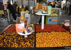 Different tomato varieties on display in the Pure Flavor booth.